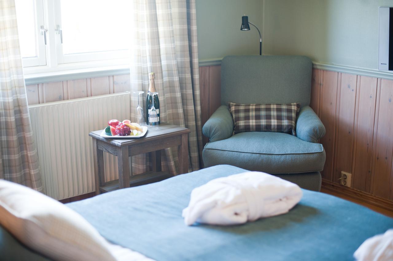 Finnskogtoppen Velvaerehotell Askosberget Rom bilde